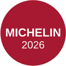 Roter Kreis mit dem Text MICHELIN 2026