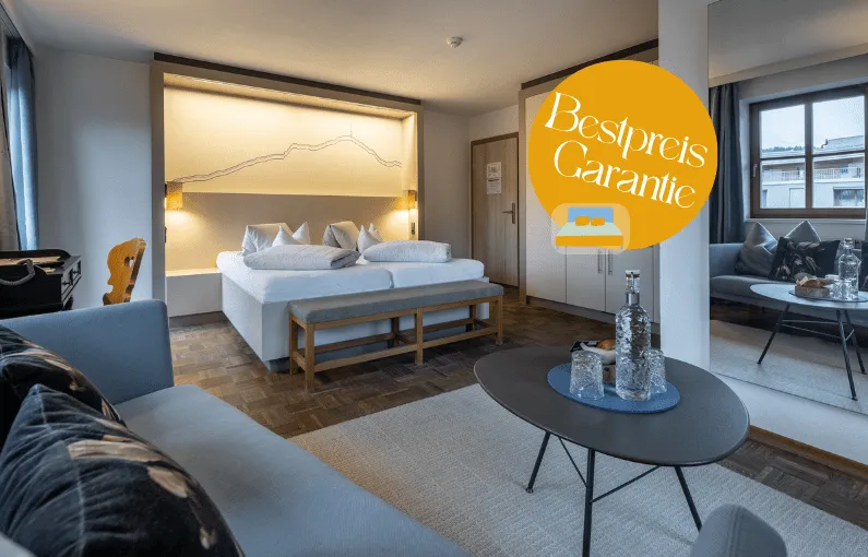 Moderne Hotelzimmeransicht mit Garantielogo.