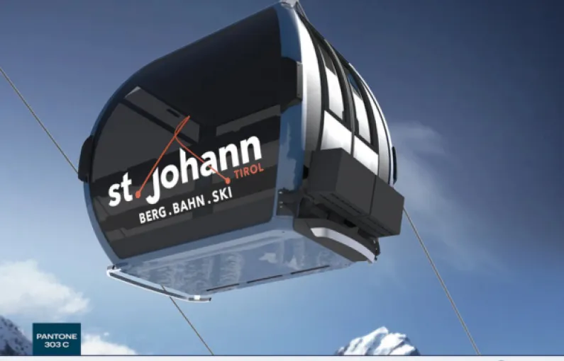 Cable car with 'st. Johann Tirol' for skiing in the mountains